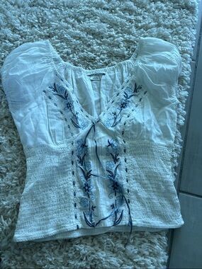 White Embroidered Peasant Top with Blue Floral Detail
